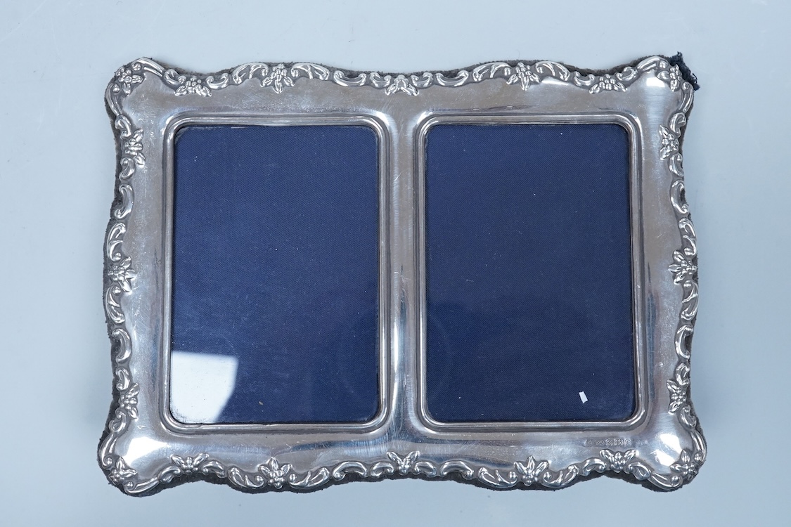 An Elizabeth II silver baluster christening mug, Wakely & Wheeler, London, 1965, with engraved inscription to the base, 10cm, together with two modern silver mounted photograph frames including a double and one other met